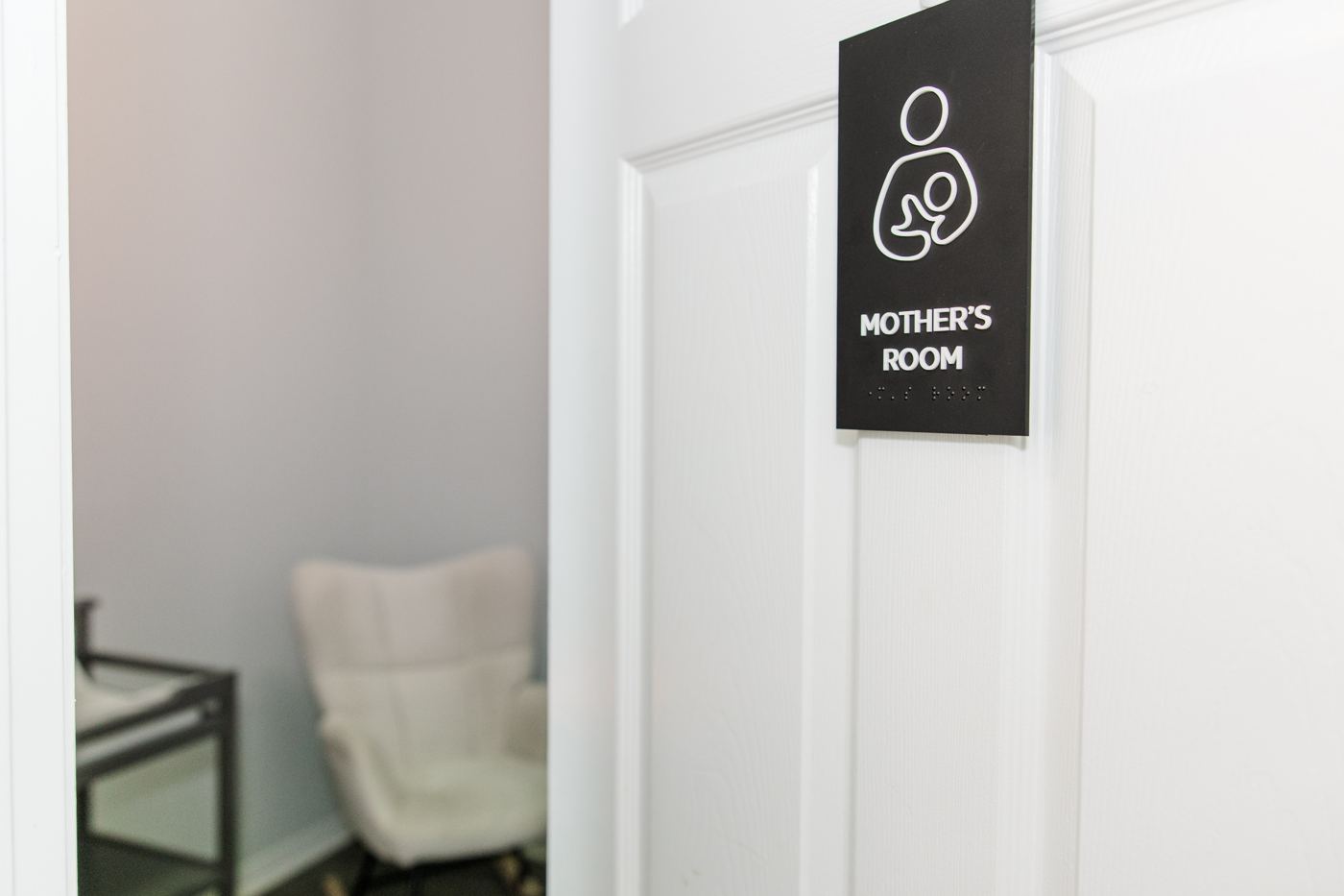 The private Mother's Room with a soft chair for nursing